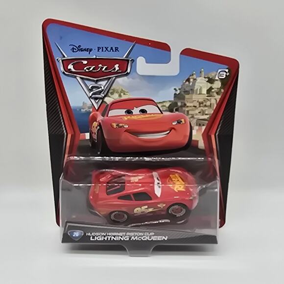 Disney Pixar Cars 2 Hudson Hornet Piston Cup Lightning McQueen #26 HTF NEW - Picture 1 of 4